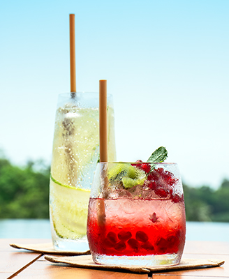 A close up of Cocktails and Mocktails served beside the Salt water pool at Haritha Villas and Spa