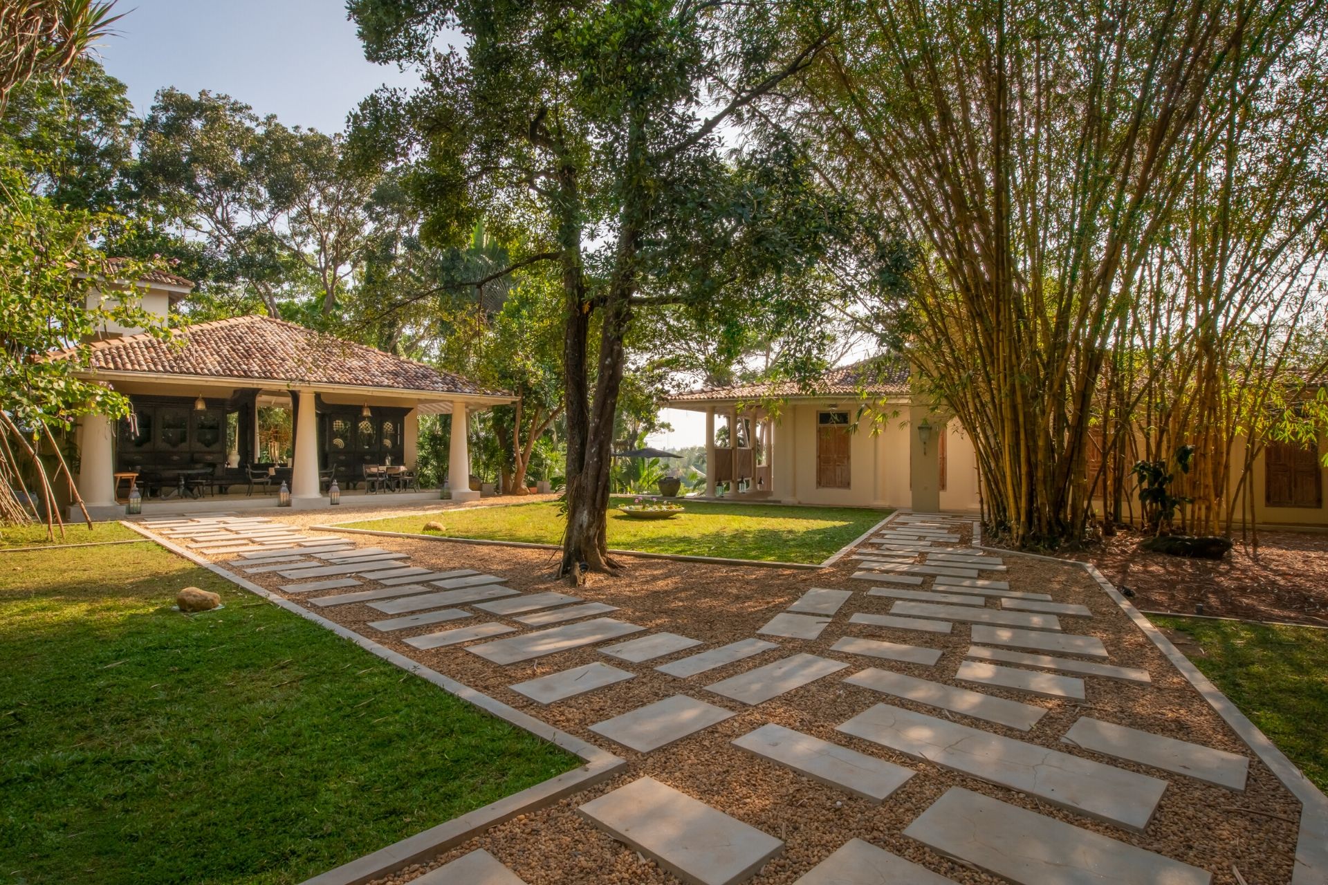 Outdoor lounge area of the colonial mansion overlooking the pool