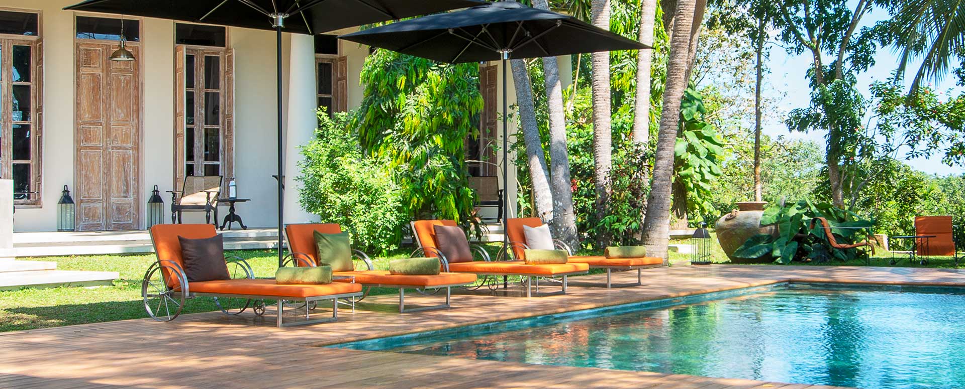 Outdoor sitting lounge overlooking the salt water pool