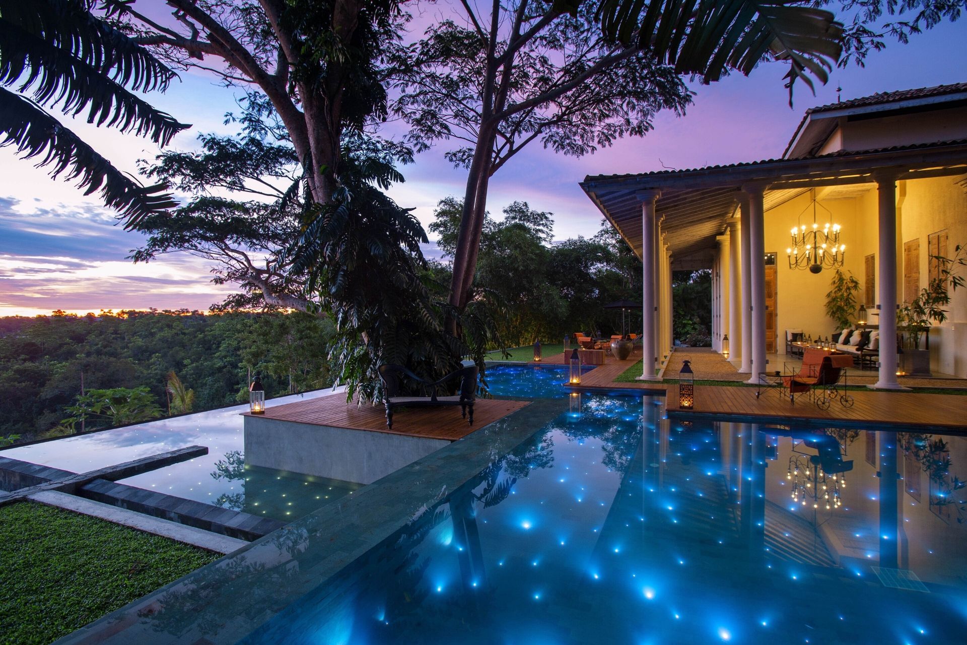 Outdoor lounge area of the colonial mansion overlooking the pool